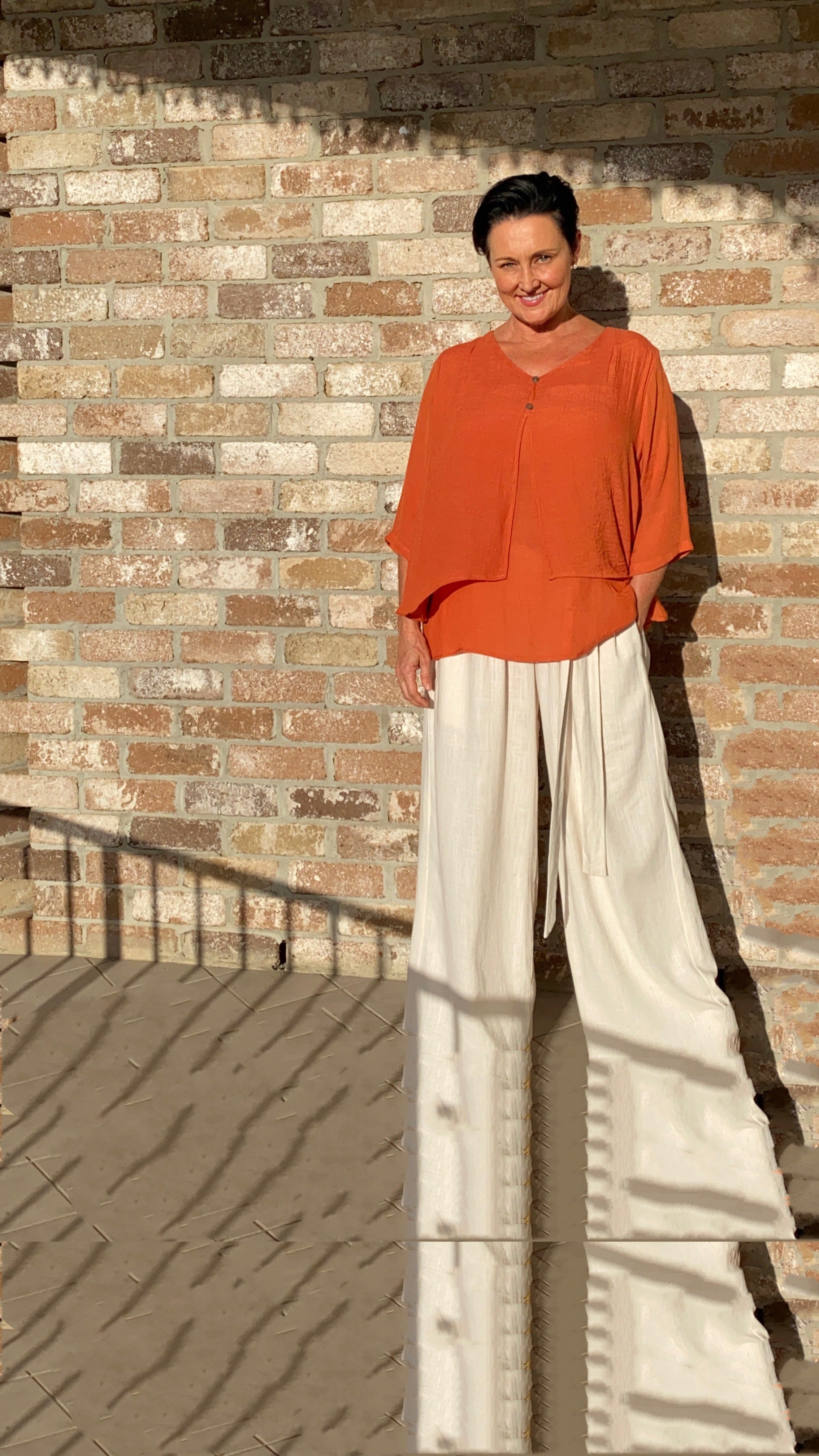Rust coloured womens bamboo cotton top over linen pants
